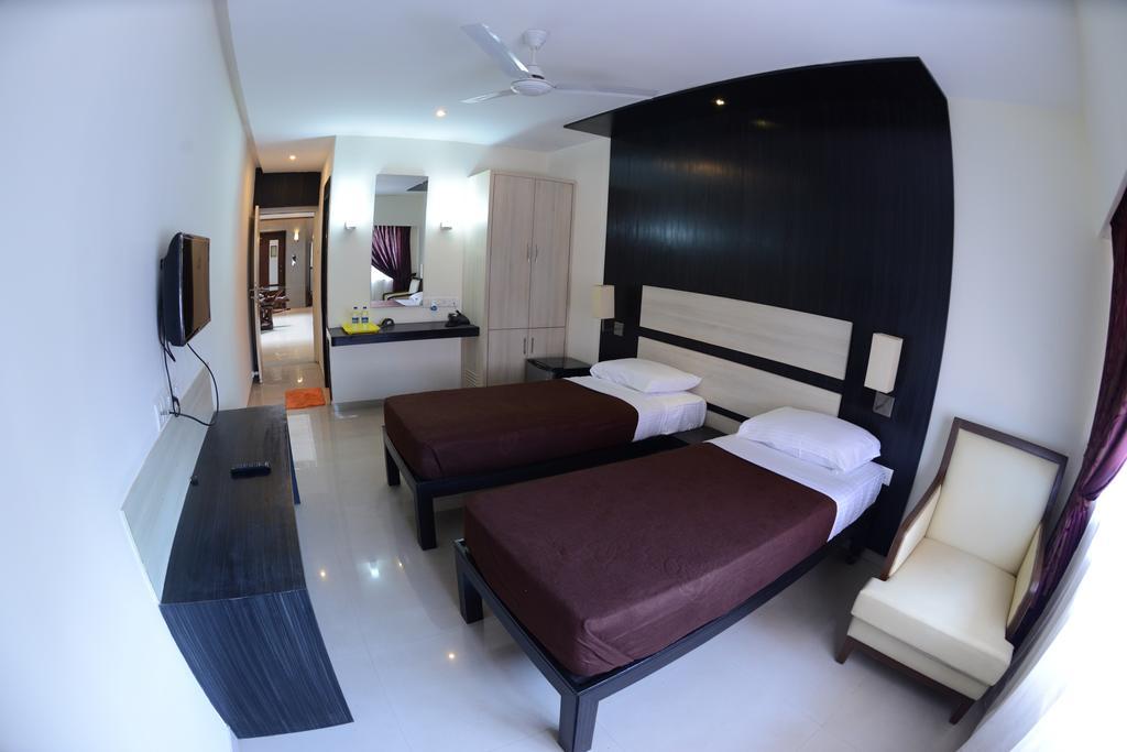 Hotel Ayush International Mangalore Quarto foto