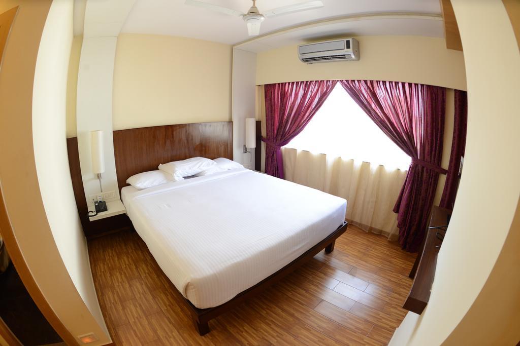Hotel Ayush International Mangalore Quarto foto